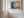 Horizontal tree ring wall art styled in a calm neutral interior