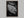 Rain Held Quietly shown in a walnut frame without a border or mount.