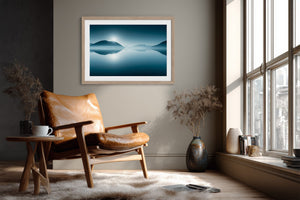 Blue Mirror mountain lake print in a light wood frame above a leather chair.