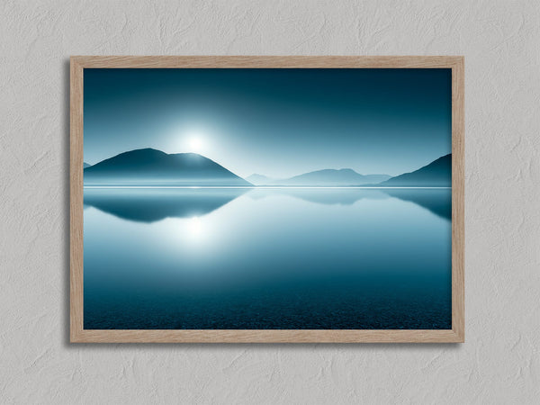 Blue Mirror shown in an oak frame without a border or mount.