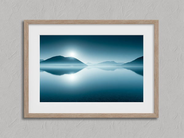 Blue Mirror shown in an oak frame with a white border or mount.