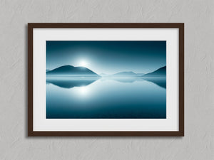 Blue Mirror shown in a walnut frame with a white border or mount.