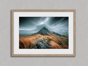 Highland Storm shown in an oak frame with a white border or mount.