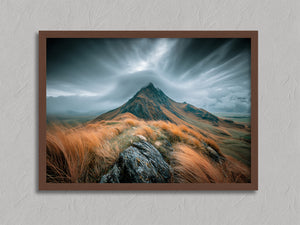 Highland Storm shown in a walnut frame without a border or mount.