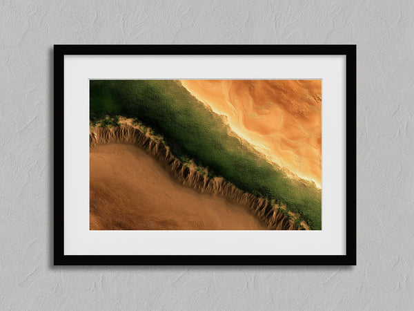 Edge of the Oasis shown in a black frame with a white border or mount.