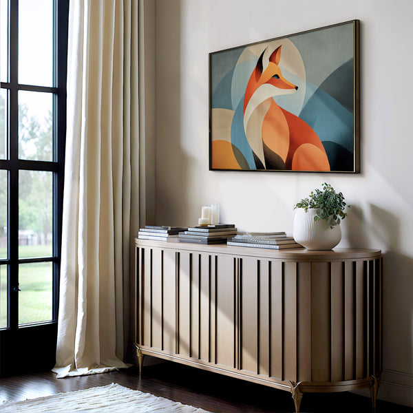 Thin dark-framed geometric fox print above a slatted console table with stacked books and a potted plant.