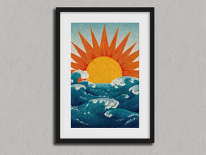 Sunrise Over Wild Water shown in a black frame with a white border or mount.