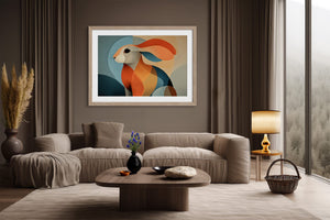 Light-framed abstract hare artwork above a cream sectional with a round wood coffee table.