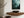 Emerald mountain canvas wall art styled in a calm neutral interior