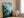 Emerald mountain canvas wall art styled in a calm neutral interior