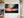 Sailboat sunset canvas wall art styled in a calm coastal interior