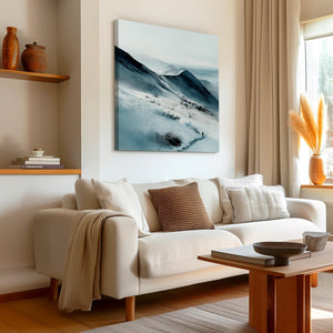 Snow-covered mountain canvas wall art styled in a calm neutral interior