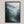 Canvas wall art of misty mountains, pines, and a calm river. A tranquil forest print in soft blues and greens. Ready to hang.