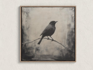 Monochrome blackbird canvas wall art with bird on winter branch