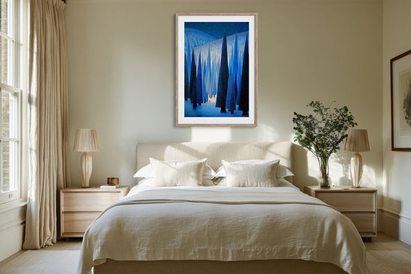 White-framed blue conifer artwork above a bed with white linens and wooden nightstands.