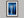 Beneath the Blue shown in a walnut frame with a white border or mount.