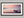 Mooring at Dusk shown in a black frame with a white border or mount.