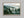 Woodland Veil shown in an oak frame without a border or mount.