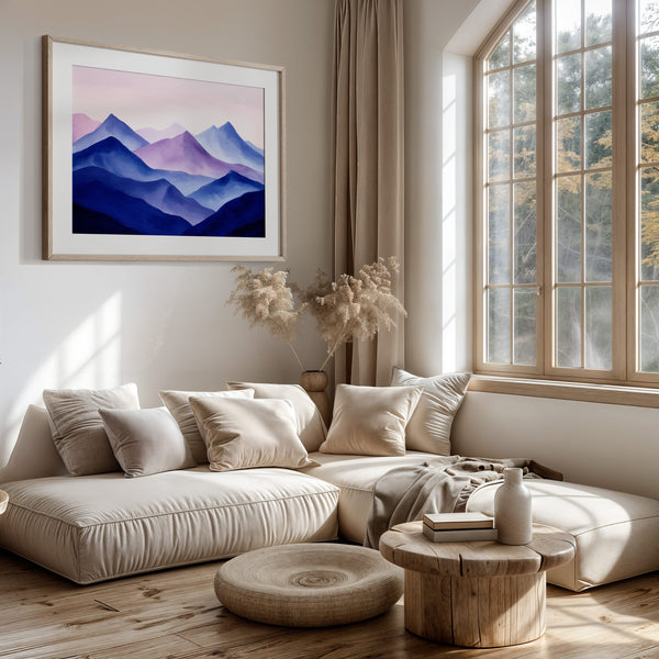 Violet Ranges mountain print in a light wood frame above a cushioned seating area.