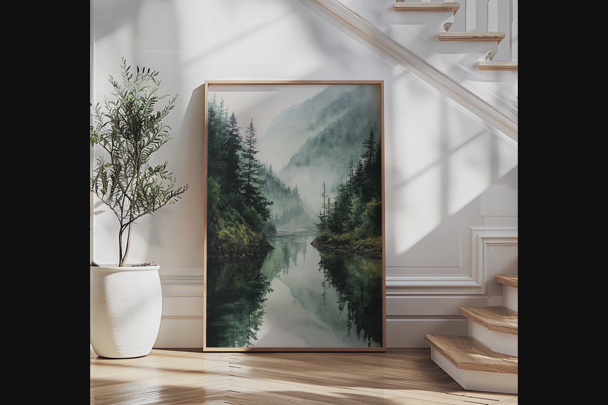 Framed wall art of a misty mountain lake. Peaceful watercolour tones, ready to hang or style your way.