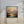 Framed wall art of a golden lake and hills at dusk. A tranquil painterly landscape print that brings warmth and peace. Ready to hang.