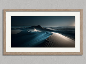 Shadowline Dunes shown in an oak frame with a white border or mount.