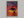 Solace at Sunrise shown in an oak frame without a border or mount.