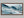 Winter Traverse shown in a walnut frame without a border or mount.