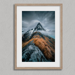 Cloudbound Peak shown in an oak frame with a white border or mount.