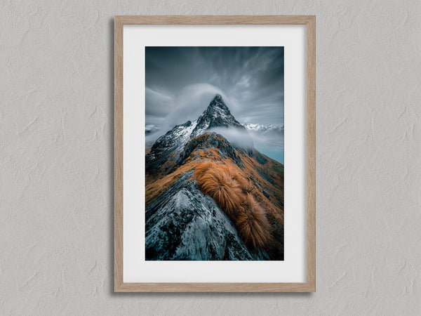 Cloudbound Peak shown in an oak frame with a white border or mount.