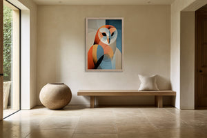 Framed geometric owl artwork above a wood bench beside a large ceramic floor vessel.