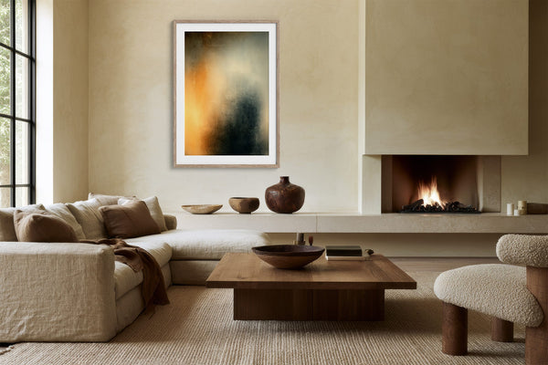 Framed Copper Veil artwork above a sectional sofa and beside a lit fireplace.