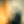Textured abstract artwork in burnt orange, ochre, blue-grey and deep charcoal