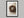 Three Small Beginnings shown in a black frame with a white border or mount.