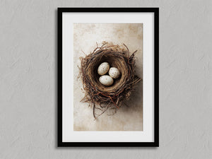 Three Small Beginnings shown in a black frame with a white border or mount.