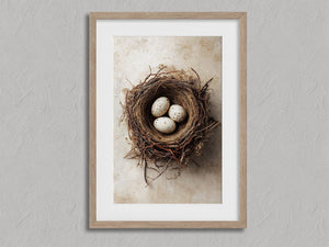 Three Small Beginnings shown in an oak frame with a white border or mount.