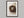Three Small Beginnings shown in a walnut frame with a white border or mount.