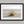 Dune Stillness shown in a black frame with a white border or mount.