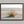 Dune Stillness shown in a walnut frame without a border or mount.