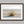 Dune Stillness shown in a walnut frame with a white border or mount.
