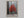 Scarlet Stillness shown in an oak frame without a border or mount.