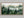 Greenwood Haze shown in an oak frame without a border or mount.