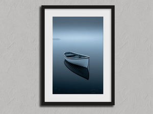Drift Afloat shown in a black frame with a white border or mount.