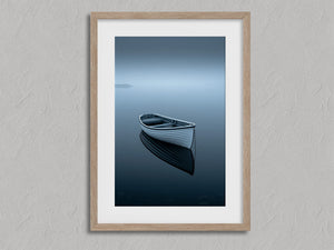 Drift Afloat shown in an oak frame with a white border or mount.
