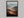 Winding Light - Desert Mountain Valley shown in a walnut frame without a border or mount.