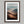 Winding Light - Desert Mountain Valley shown in a walnut frame with a white border or mount.